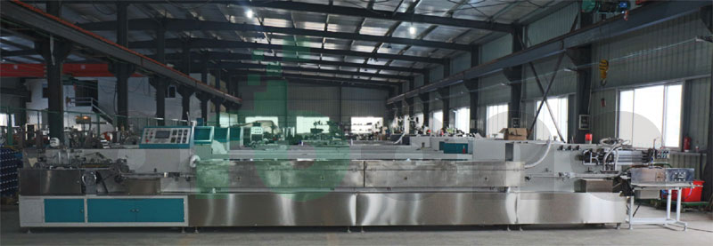 a complete cotton swab production line including making machine oven and packing station with stainless steel construction