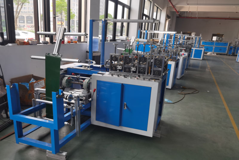 Plastic shoe cover making machine